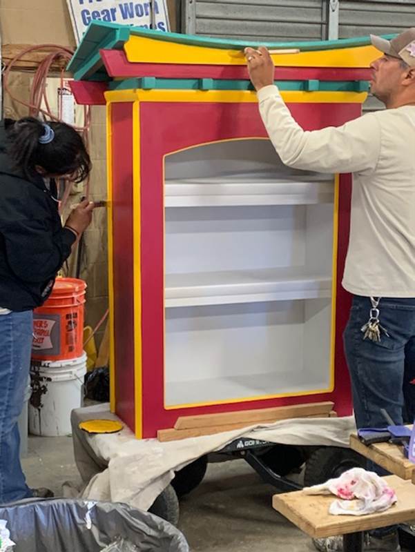 Image of lending library being painted