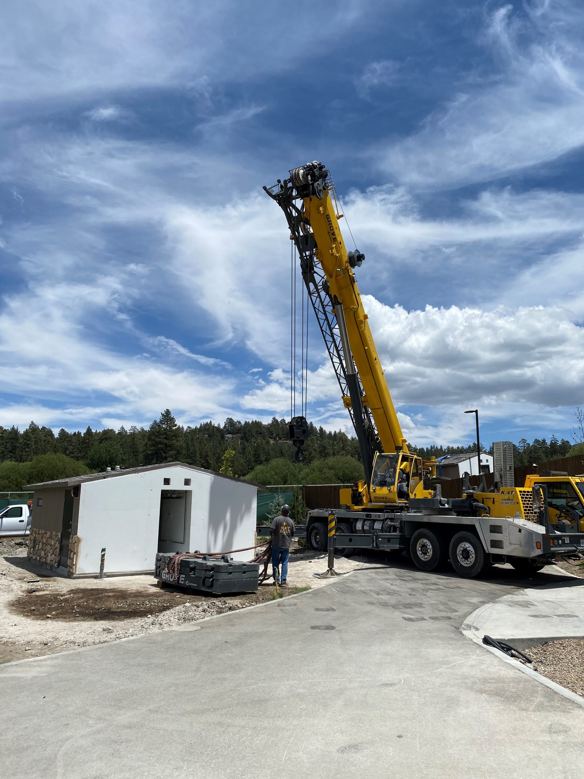 Crane installing new restroom and snack bar at the Zoo